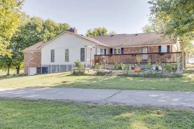 a house view with a garden space