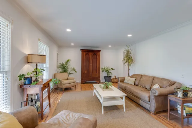 a living room with furniture and a couch