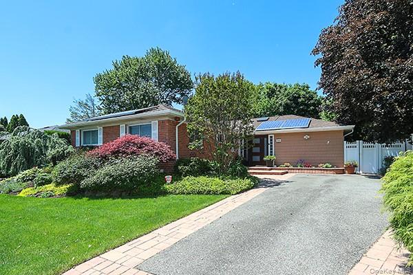 32 Randy Lane Plainview, NY 11803 - Photo 2 of 26 a view of a house with yard and a garden