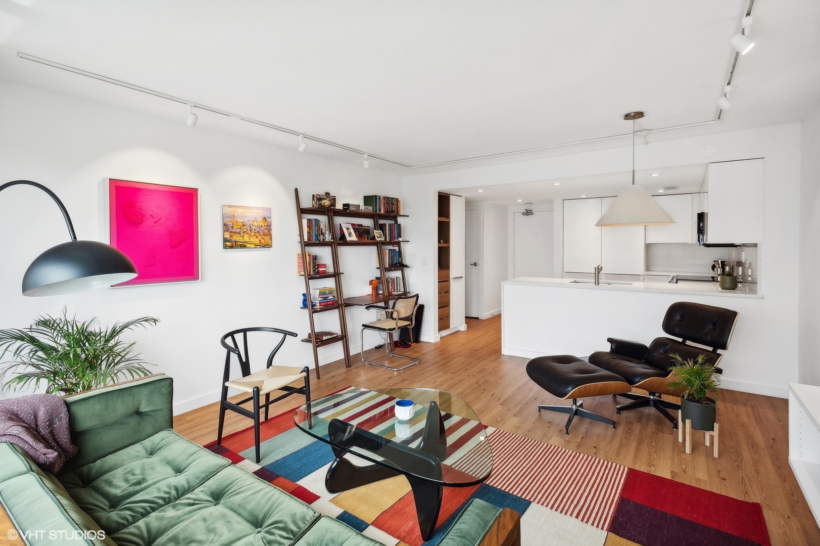 3100 North Lake Shore Drive, Unit 1404 Chicago, IL 60657 - Photo 6 of 15 a living room with furniture a rug and white walls