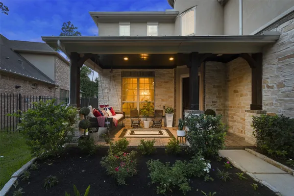 a view of a porch with seating space