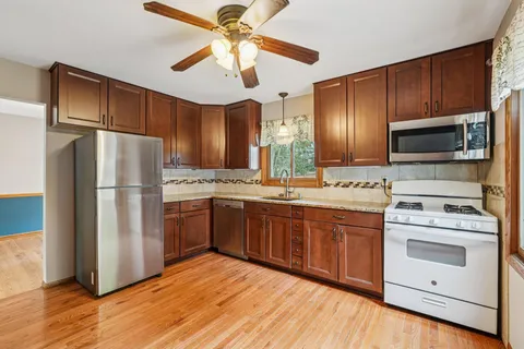 $395,000 | 1164 Downing Drive, Waukesha, WI 53186