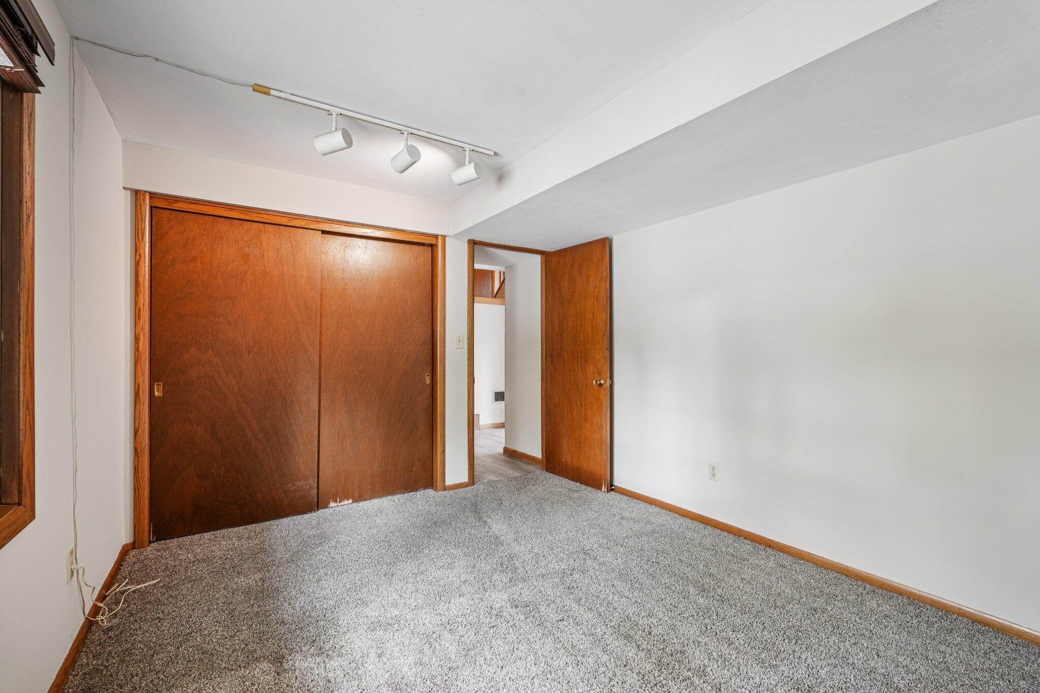 1164 Downing Drive Waukesha, WI 53186 - Photo 20 of 46 lower level bedroom