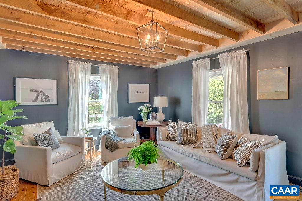 923 Smith Road Afton, VA 22920 - Photo 3 of 34 a living room with furniture and a large window