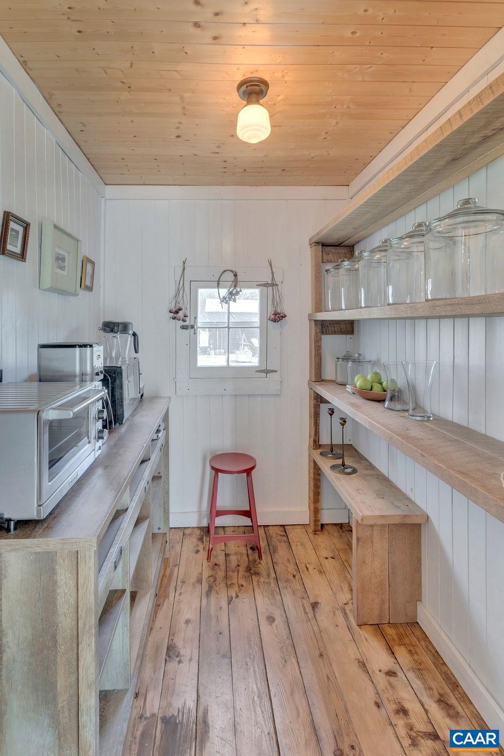 923 Smith Road Afton, VA 22920 - Photo 10 of 34 a kitchen with a sink and wooden floor