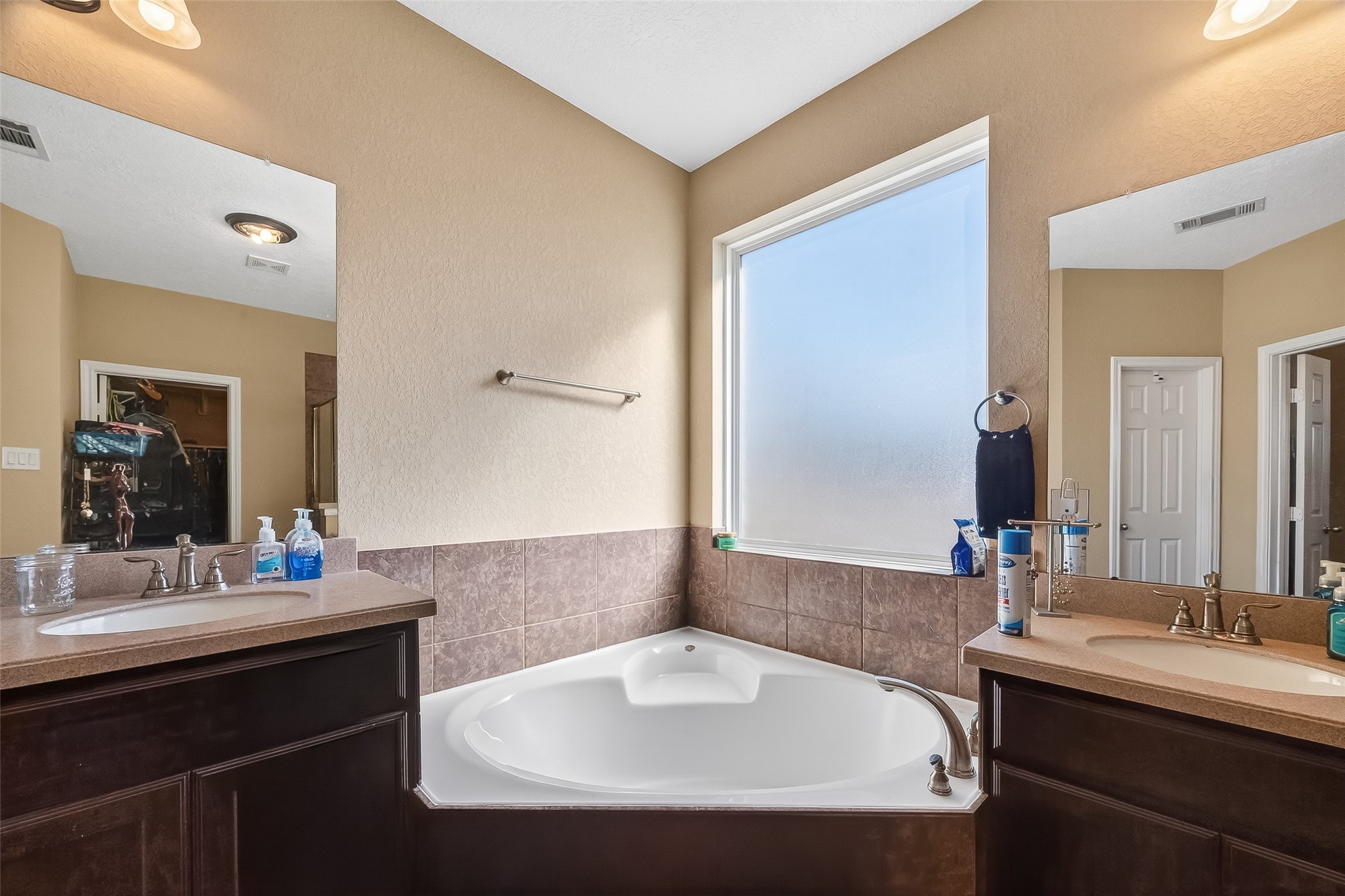 3418 Barbers Hill Road Highlands, TX 77562 - Photo 33 of 50 a bathroom with a sink and a mirror