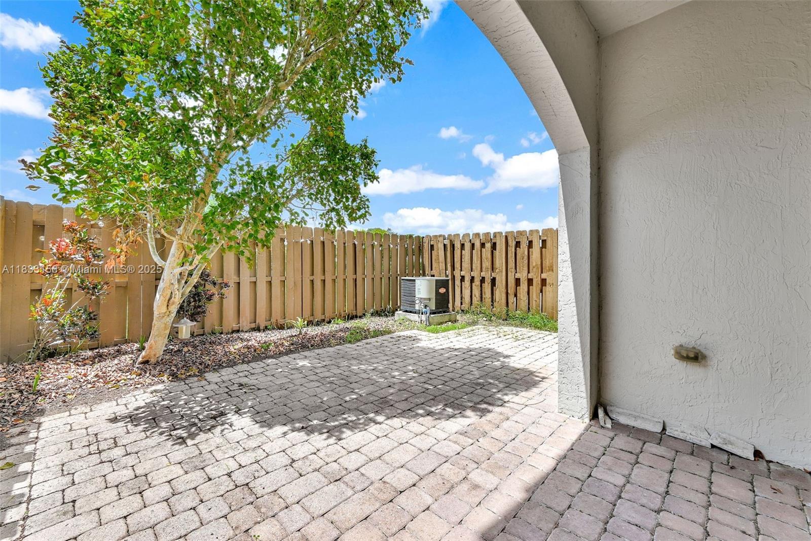 Doral Doral, FL 33172 - Photo 35 of 63 a view of outdoor space with wooden fence