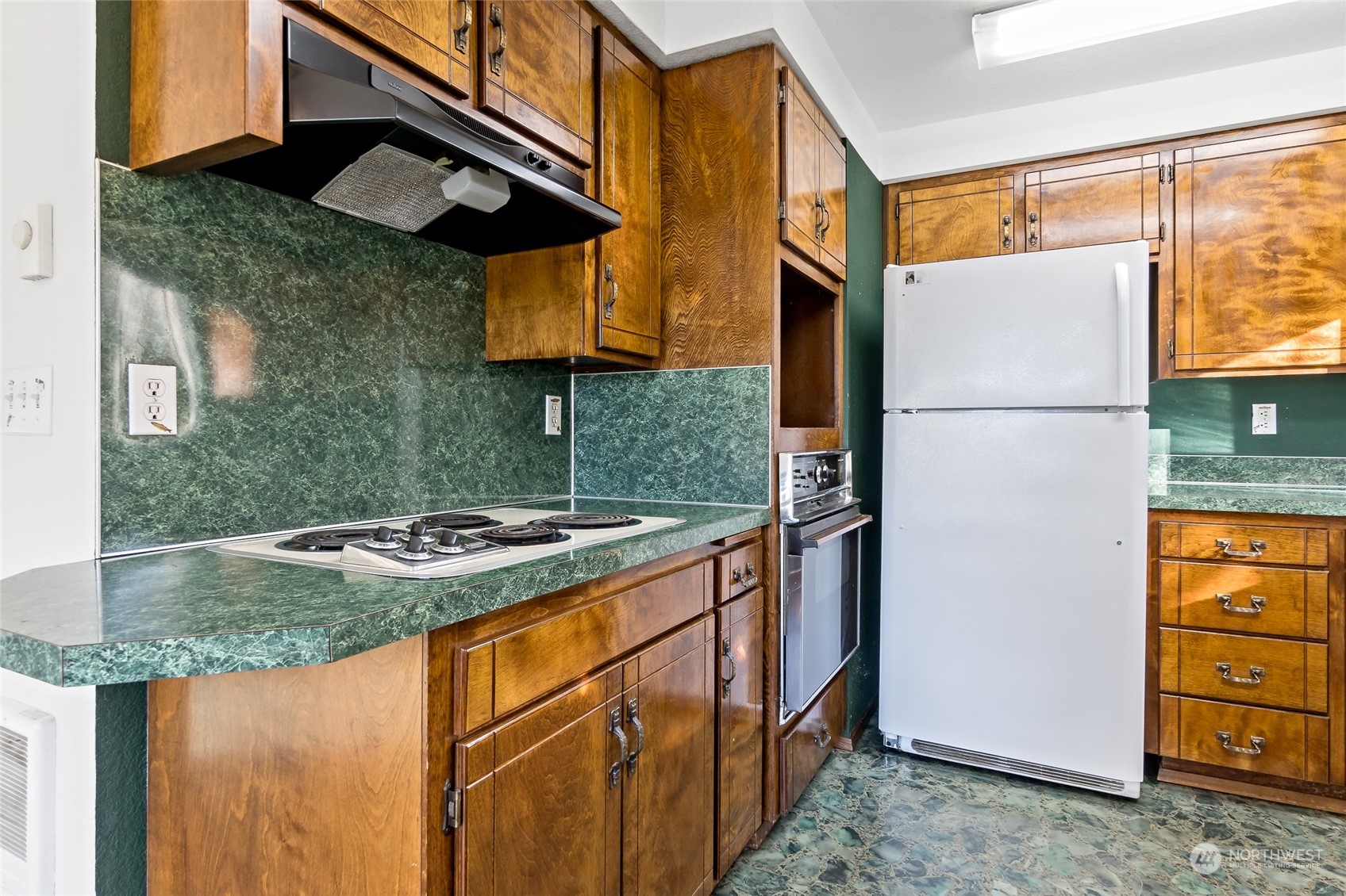 481 Arrowhead Drive Elma, WA 98541 - Photo 15 of 32 a kitchen with stainless steel appliances granite countertop a stove and a refrigerator