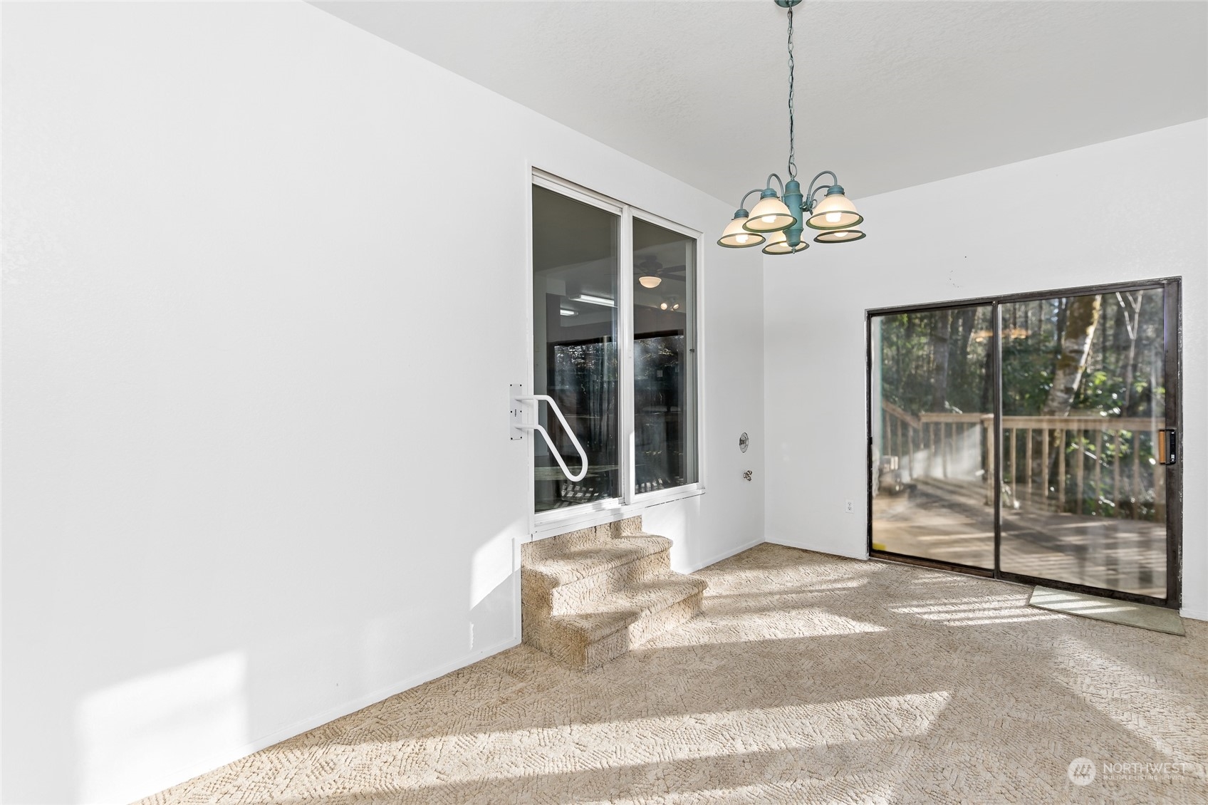 481 Arrowhead Drive Elma, WA 98541 - Photo 22 of 32 a view of a room with a chandelier and living room