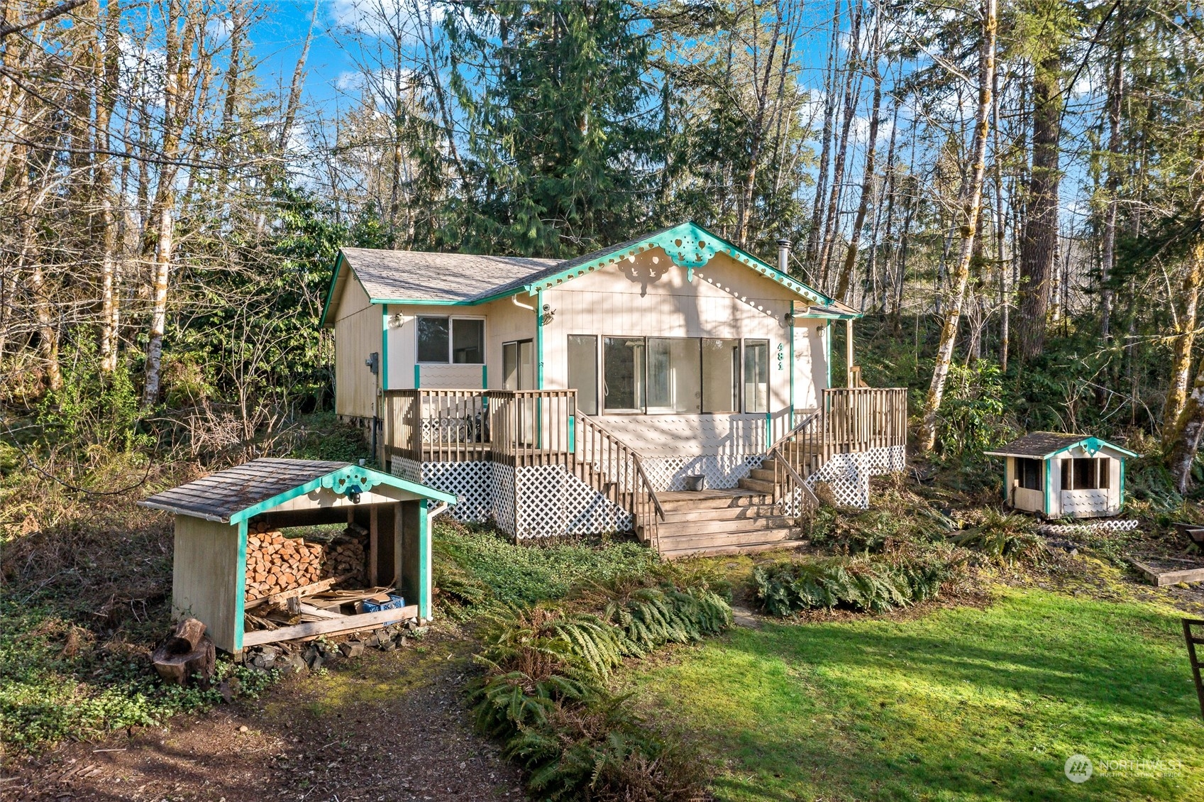 481 Arrowhead Drive Elma, WA 98541 - Photo 6 of 32 a front view of a house with garden