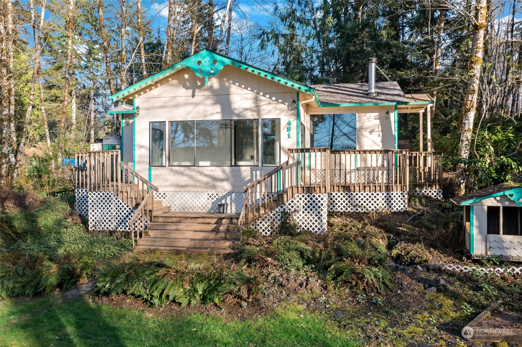 481 Arrowhead Drive Elma, WA 98541 - Photo 7 of 32 a view of a house with backyard and sitting area