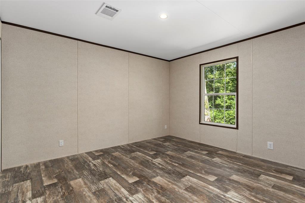 2455 East North Street Inverness, FL 34453 - Photo 21 of 27 a view of a room that has a window in it