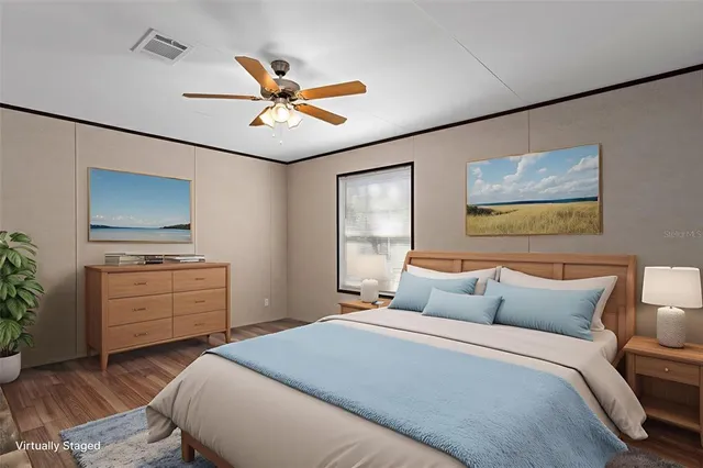 a bedroom with a bed and a dresser