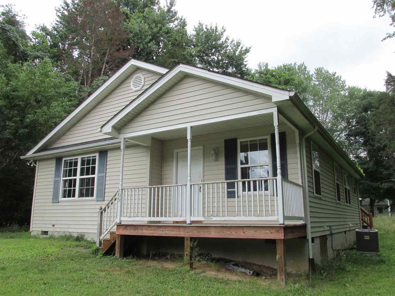 109 Fairview Road Louisa, VA 23093 - Photo 1 of 8 a view of backyard with deck and garden
