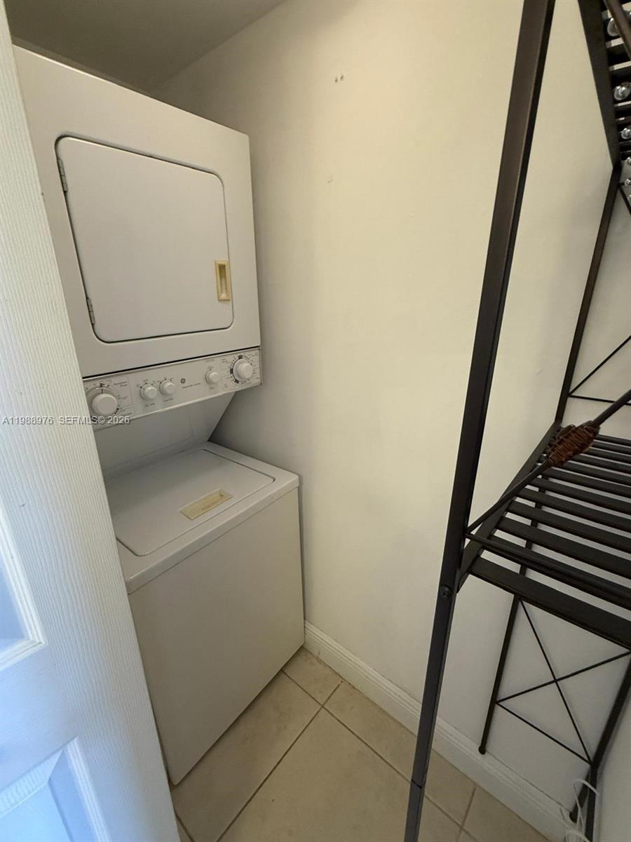 11780 Southwest 18th Street, Unit 2302 Miami, FL 33175 - Photo 11 of 15 a utility room with dryer and washer