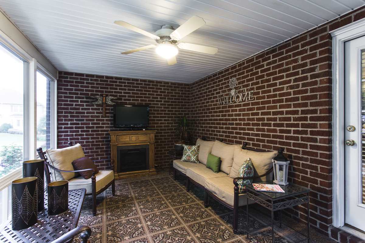 3739 Traveler Road Harrisonburg, VA 22801 - Photo 34 of 44 The enclosed porch extends the seasonal use with the feature of a fireplace