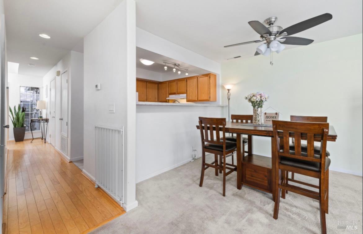605 Laurel Grove Circle Santa Rosa, CA 95407 - Photo 10 of 29 a view of a dining room with furniture and wooden floor