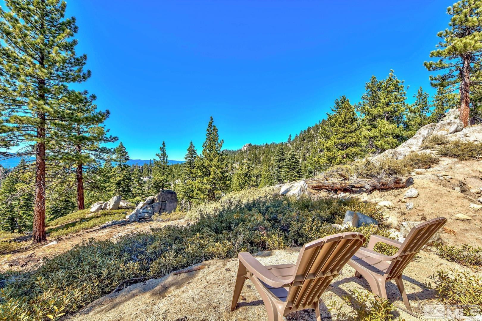 256 North Benjamin Drive Stateline, NV 89449 - Photo 30 of 36 a view of chairs and fire pit