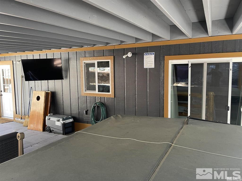 256 North Benjamin Drive Stateline, NV 89449 - Photo 35 of 36 a view of a hallway with a flat screen tv