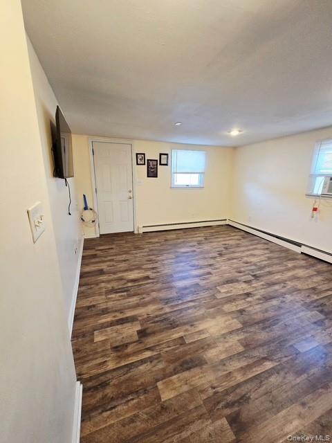 6 East Kissimee Road Lindenhurst, NY 11757 - Photo 12 of 15 a view of a livingroom with wooden floor