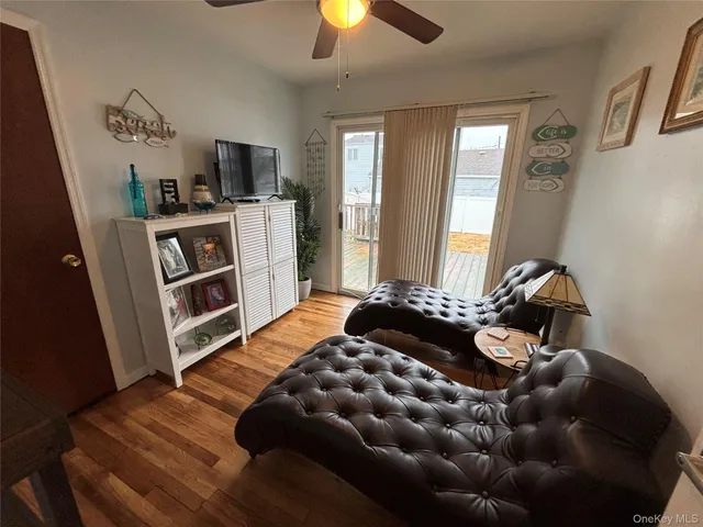 a bedroom with furniture and a chandelier