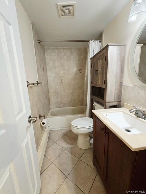 6 East Kissimee Road Lindenhurst, NY 11757 - Photo 13 of 15 a bathroom with a sink mirror toilet and shower