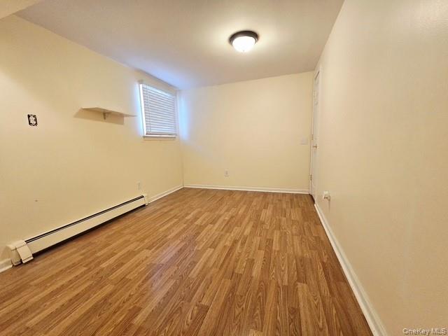 6 East Kissimee Road Lindenhurst, NY 11757 - Photo 10 of 15 a view of a room with wooden floor