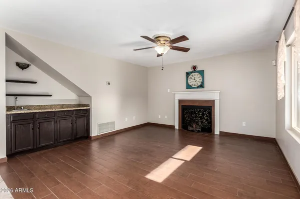 a kitchen with stainless steel appliances granite countertop a stove and a microwave