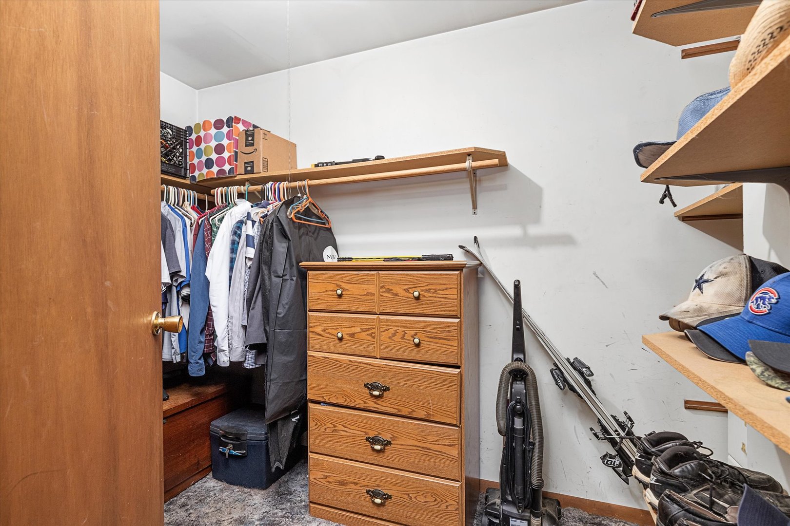 6236 Washington Street Chicago Ridge, IL 60415 - Photo 22 of 32 a view of walk in closet with clothes and shoes