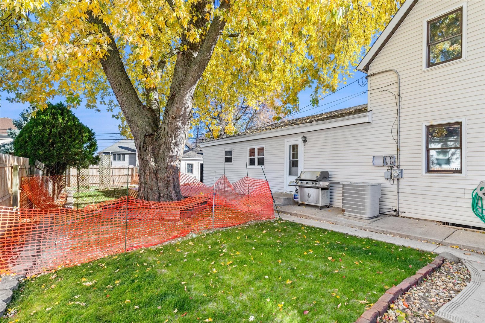 6236 Washington Street Chicago Ridge, IL 60415 - Photo 32 of 32 a view of a house with backyard and a tree