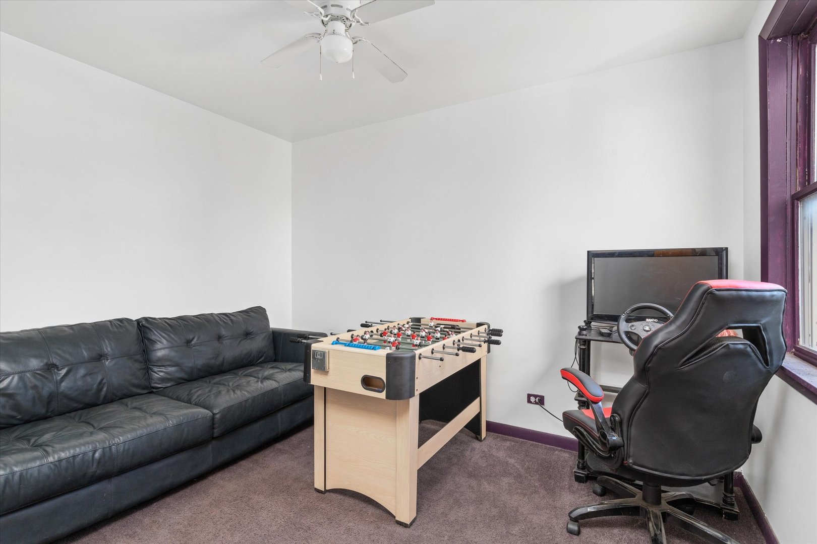 6236 Washington Street Chicago Ridge, IL 60415 - Photo 5 of 32 a living room with furniture and a flat screen tv