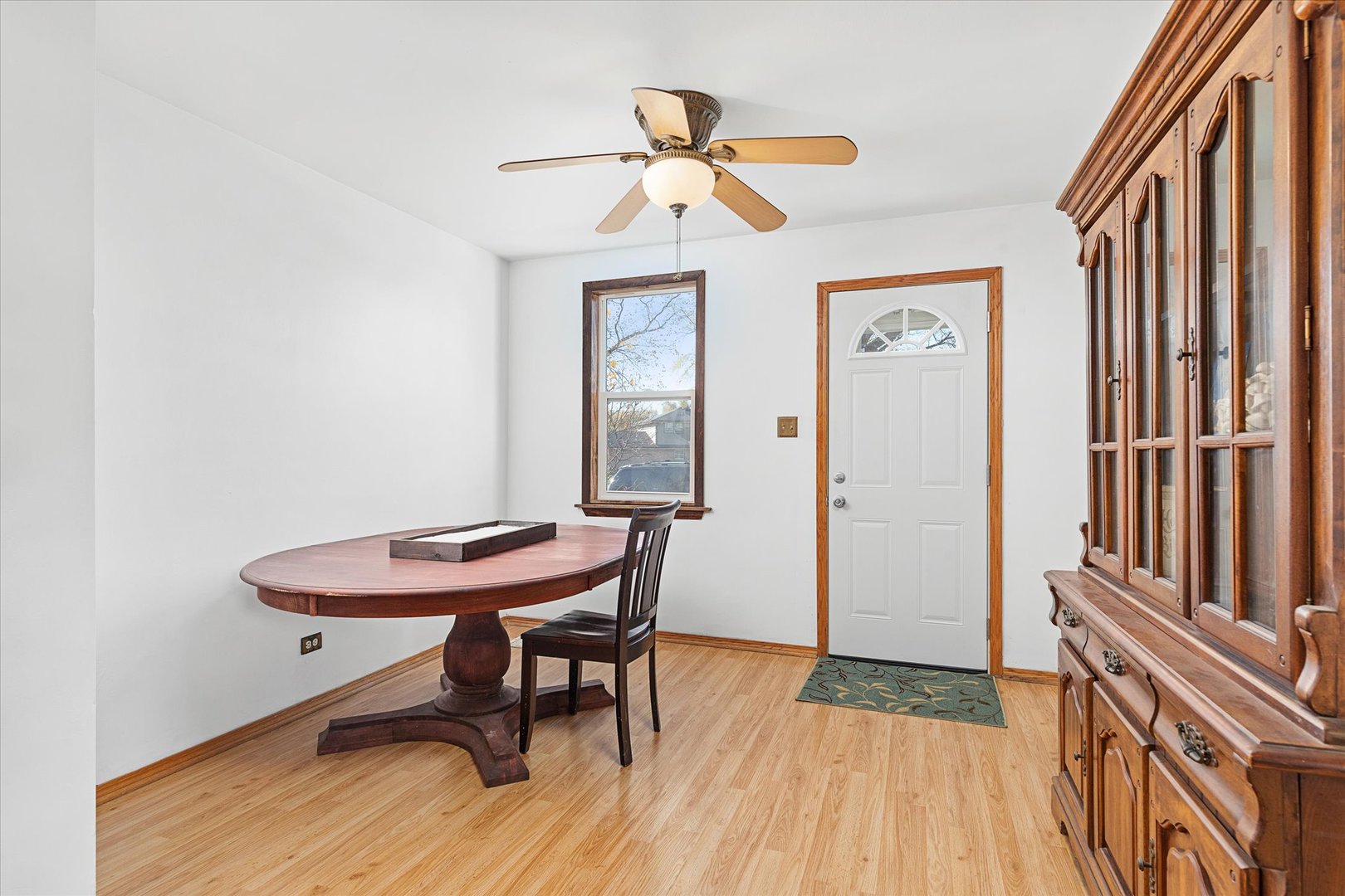 6236 Washington Street Chicago Ridge, IL 60415 - Photo 6 of 32 a view of a room with furniture and wooden floor