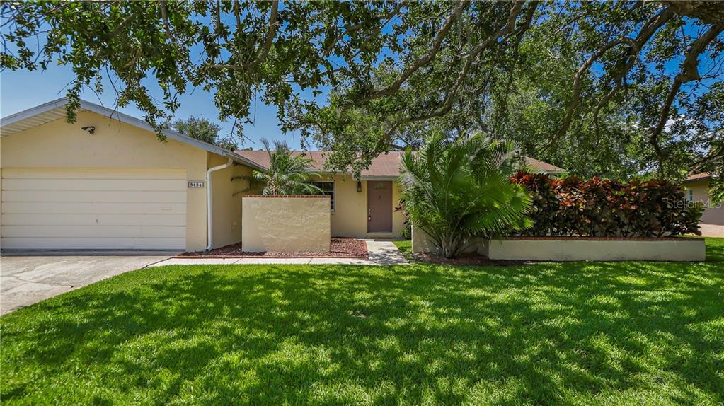 Beautifully landscaped front yard with attached 2 Car Garage!