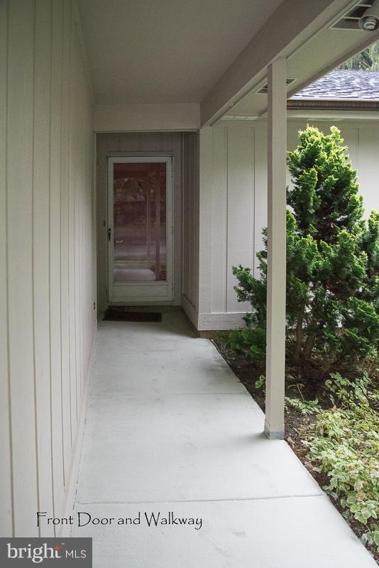 11302 Gatesborough Lane Reston, VA 20191 - Photo 2 of 30 a view of a car garage door