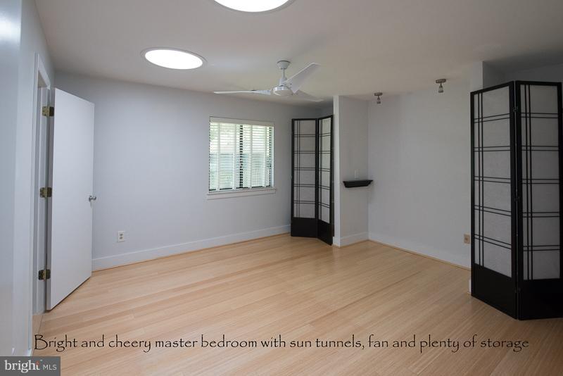 11302 Gatesborough Lane Reston, VA 20191 - Photo 15 of 30 a view of an empty room with a window
