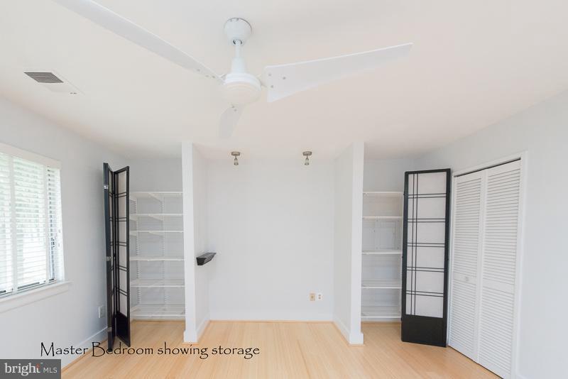 11302 Gatesborough Lane Reston, VA 20191 - Photo 17 of 30 a view of an empty room with a window