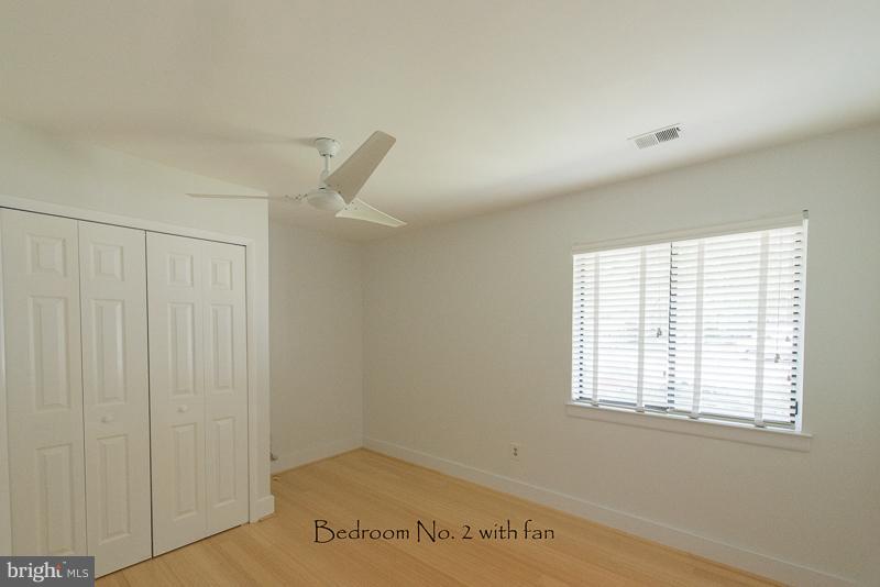 11302 Gatesborough Lane Reston, VA 20191 - Photo 23 of 30 a view of an empty room with a window
