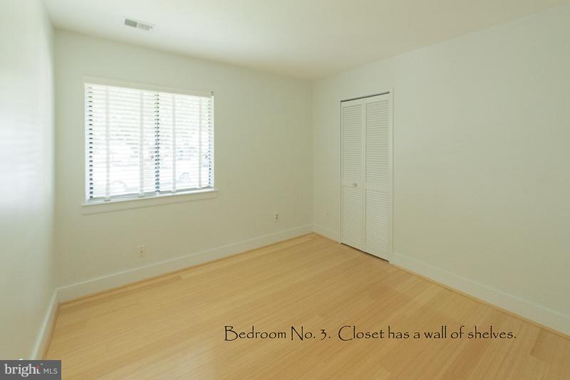 11302 Gatesborough Lane Reston, VA 20191 - Photo 24 of 30 a view of an empty room with a window