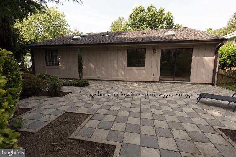 11302 Gatesborough Lane Reston, VA 20191 - Photo 26 of 30 a front view of a house with a yard