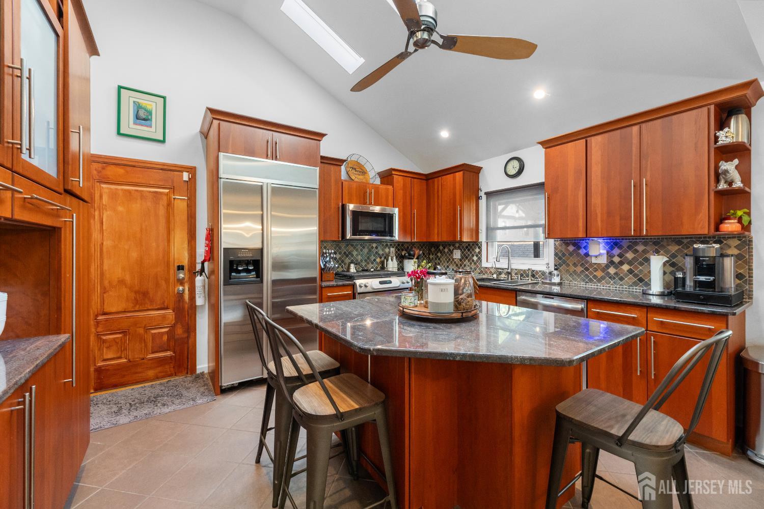 116 Player Avenue Edison, NJ 08817 - Photo 11 of 40 a kitchen with stainless steel appliances granite countertop a sink refrigerator and cabinets