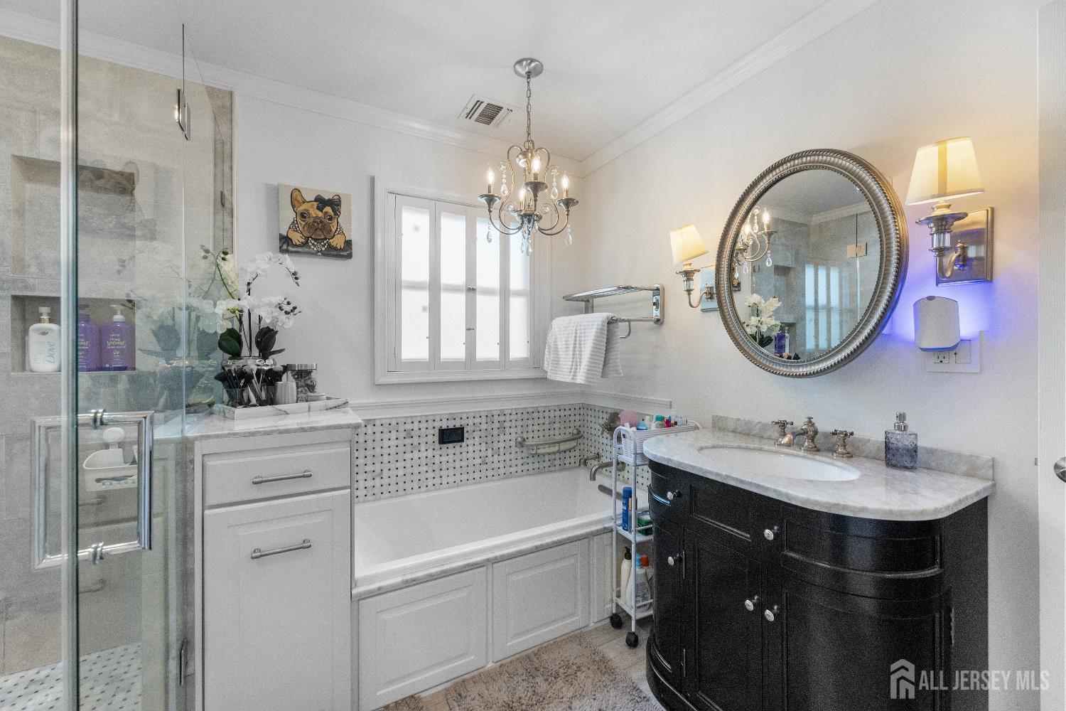 116 Player Avenue Edison, NJ 08817 - Photo 16 of 40 a bathroom with a sink vanity and a mirror