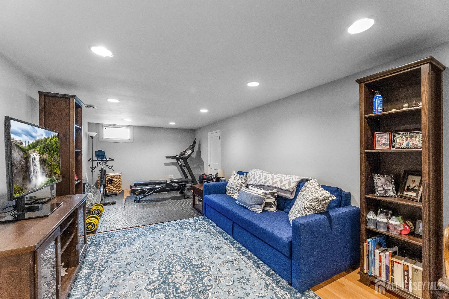 116 Player Avenue Edison, NJ 08817 - Photo 20 of 40 a living room with furniture and a flat screen tv