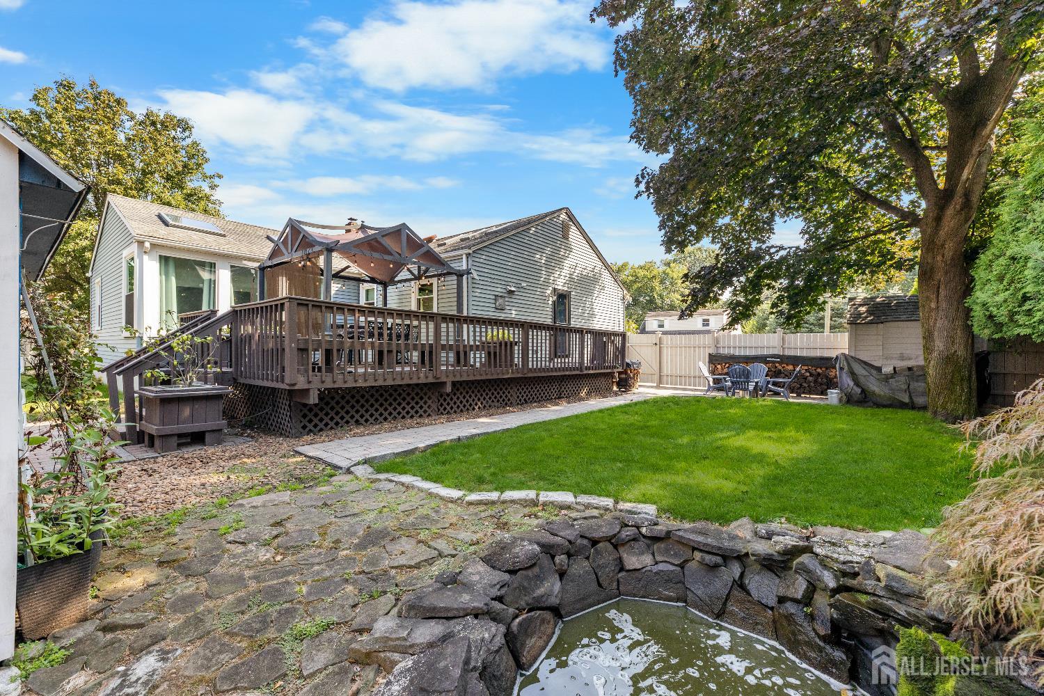 116 Player Avenue Edison, NJ 08817 - Photo 25 of 40 a view of a house with a back yard