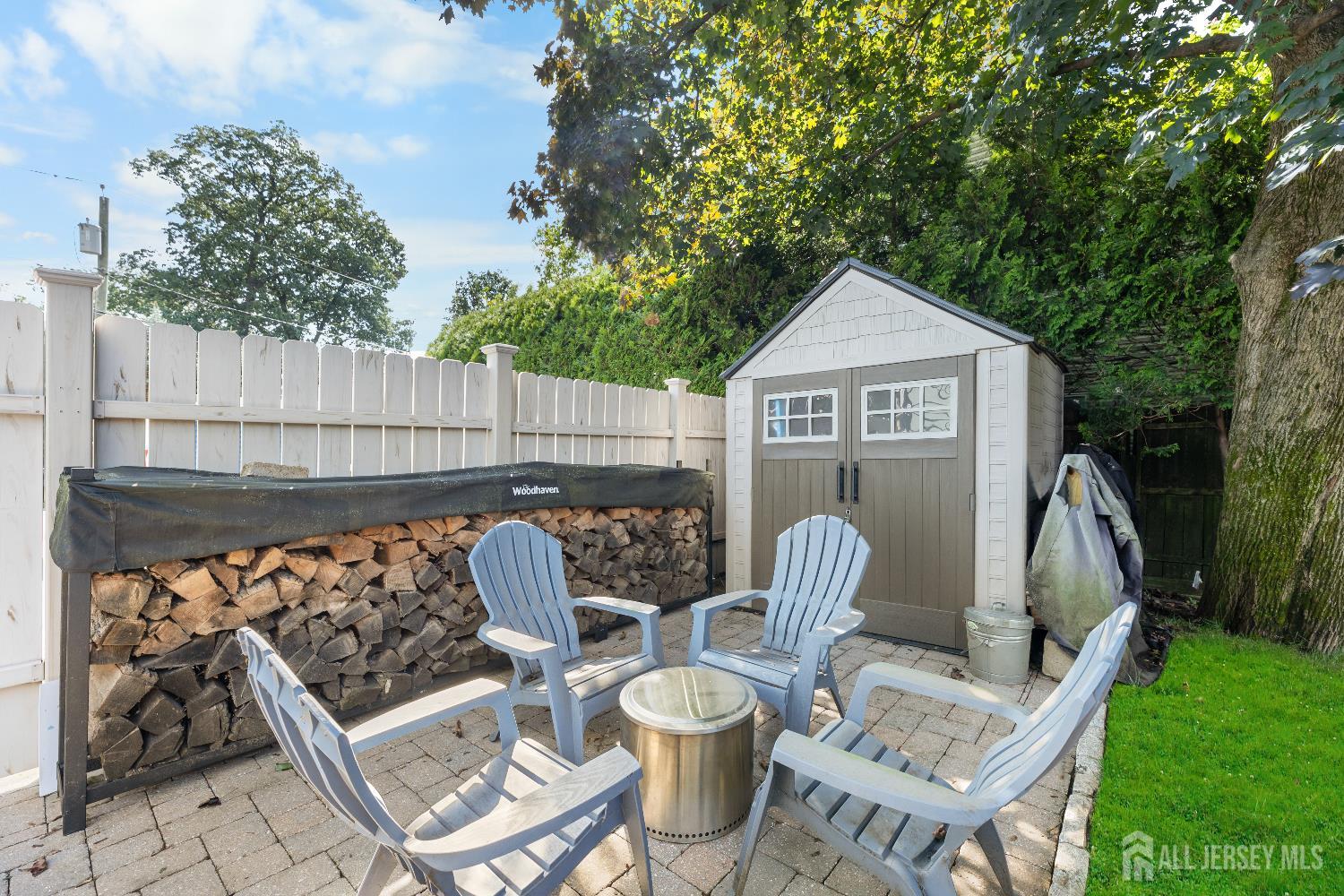 116 Player Avenue Edison, NJ 08817 - Photo 29 of 40 a view of a chairs and table in backyard of the house