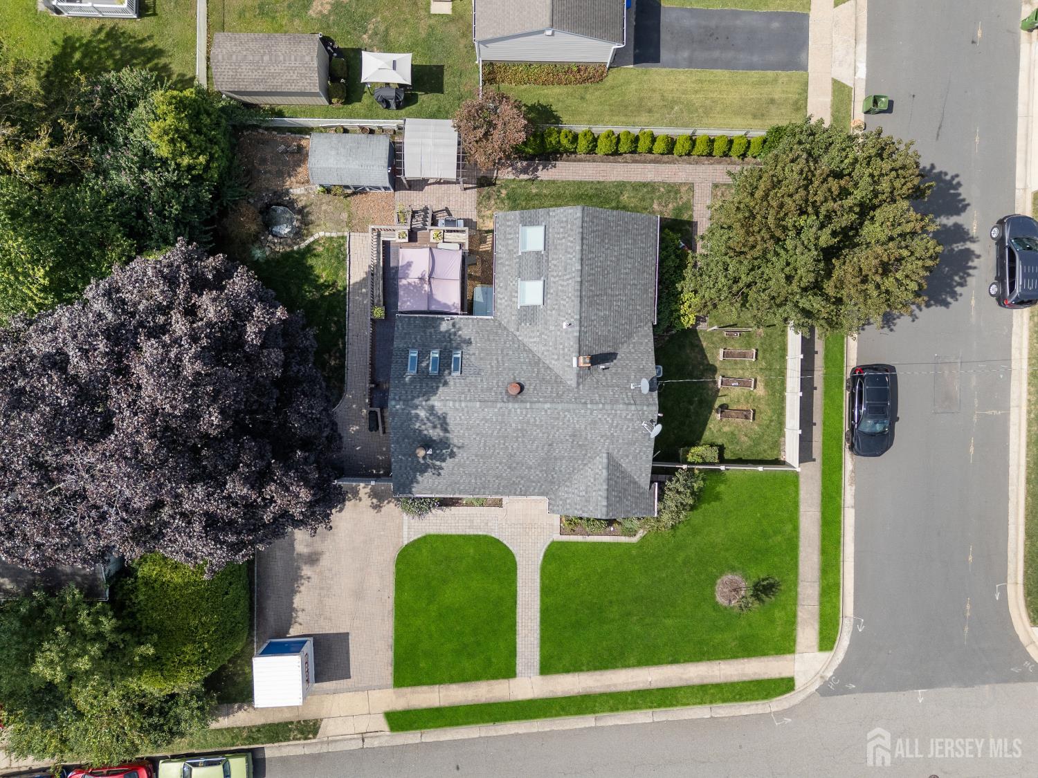 116 Player Avenue Edison, NJ 08817 - Photo 31 of 40 an aerial view of a house with garden space and street view