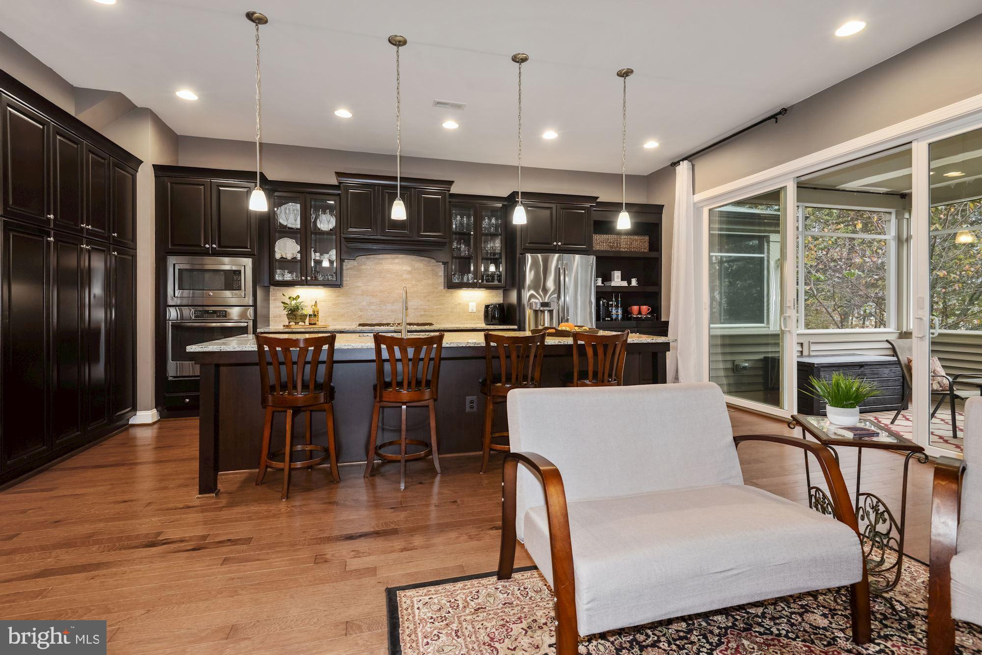 23524 Epperson Square Brambleton, VA 20148 - Photo 14 of 36 Kitchen with Access to Screened in Porch
