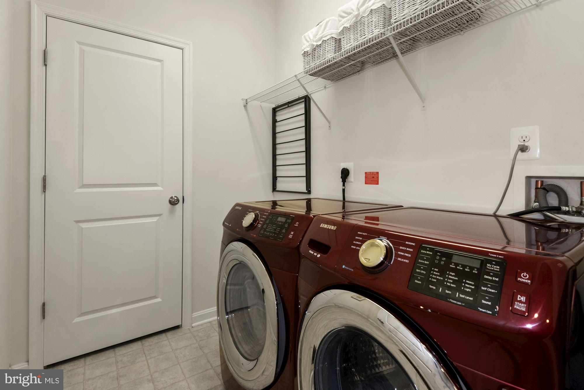 23524 Epperson Square Brambleton, VA 20148 - Photo 27 of 36 Laundry Room with Linen Closet on Upper Level