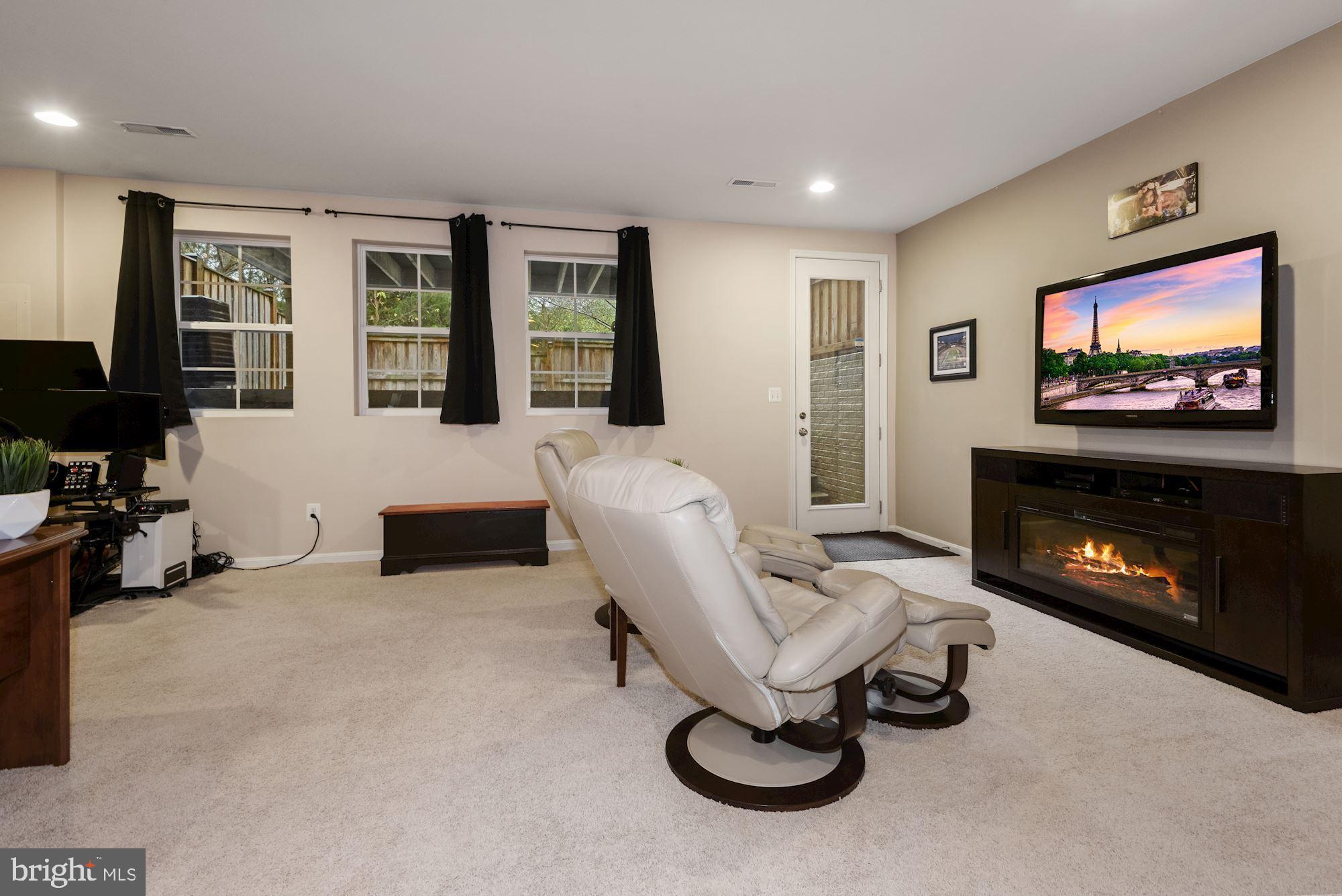 23524 Epperson Square Brambleton, VA 20148 - Photo 28 of 36 Recreation Room with Walk-Up Stairs to Backyard