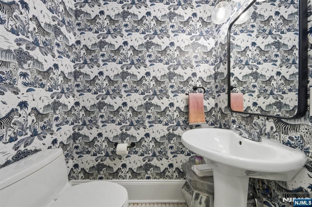 34 Prescott Avenue Montclair, NJ 07042 - Photo 15 of 40 a bathroom with a sink and a toilet
