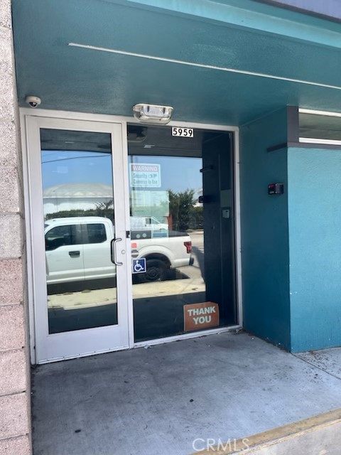 5959 Cherry Avenue Long Beach, CA 90805 - Photo 5 of 11 a view of a hallway with a washer and dryer